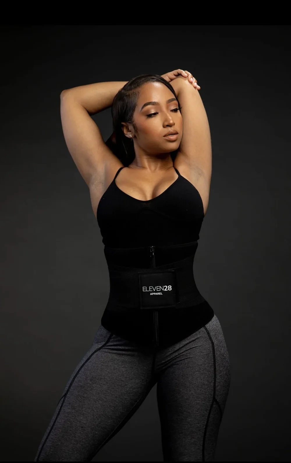 Shayla wearing the black Eleven28 waist trainer