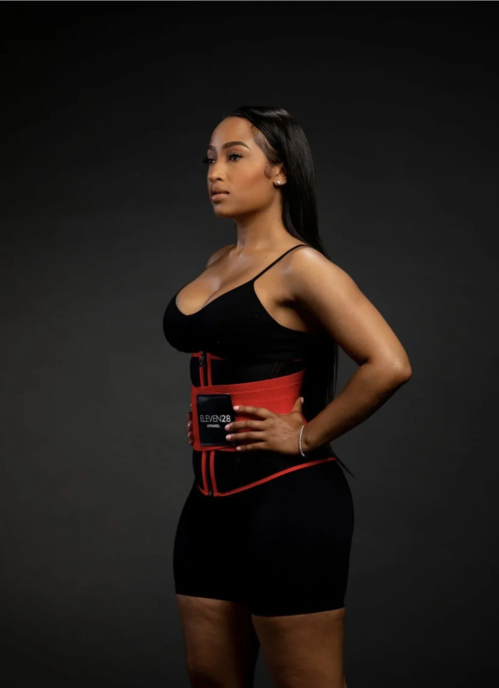 Shayla wearing the red Eleven28 waist trainer